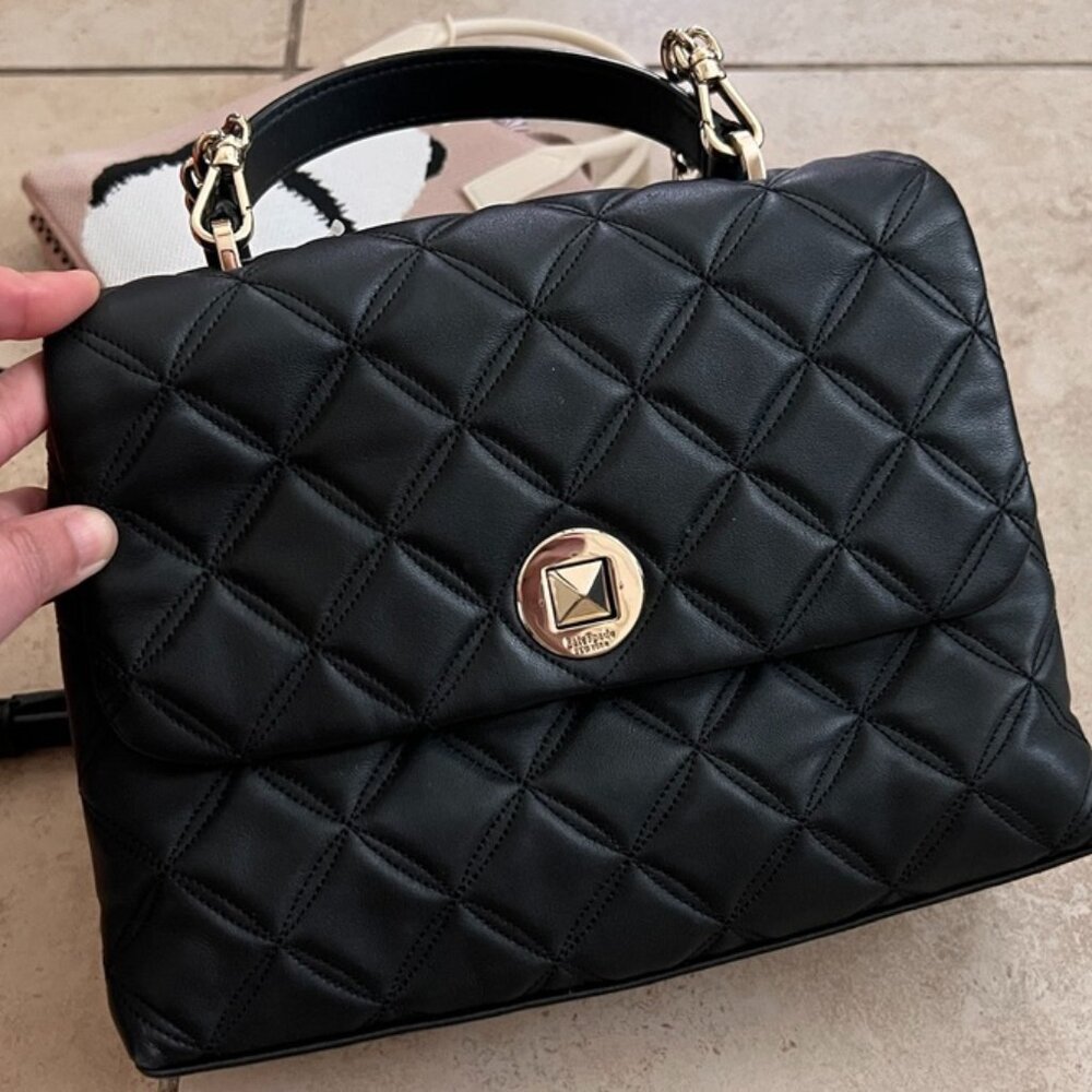 Likely used Kate Spade bag